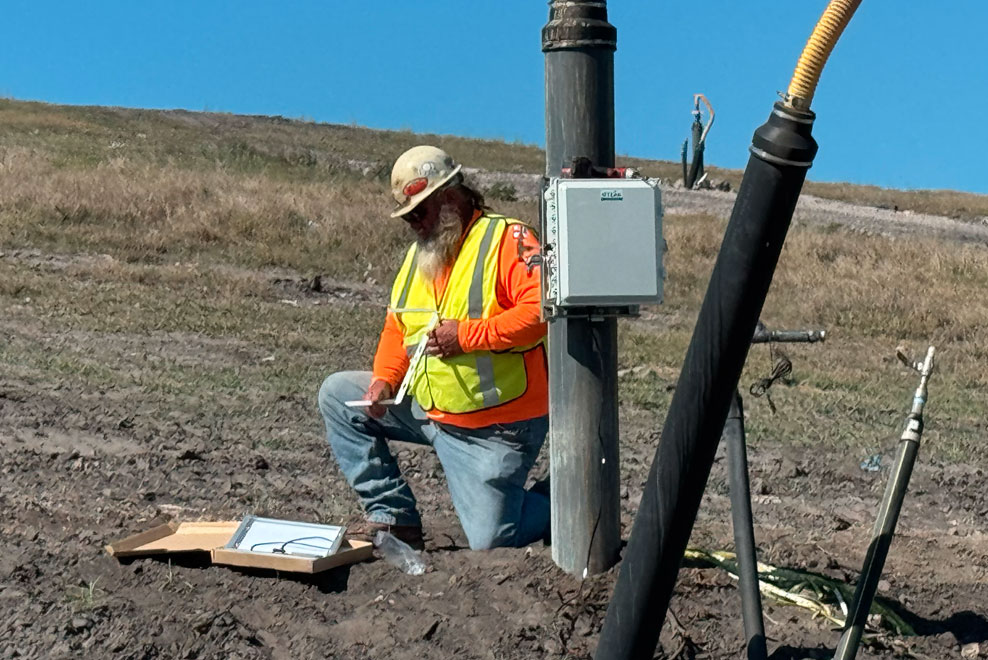 IET employee working in field